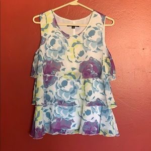 Sleeveless layered floral top.
